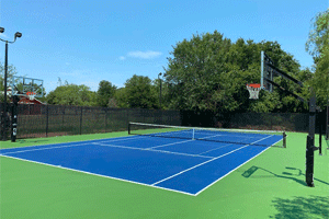 Residential Tennis Court and Batting Cage Laykold tennis court surfacing